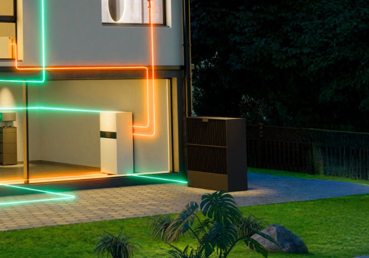 Energiehaus evm Haus bei Nacht mit eingezeichneten leuchtenden Energieflüssen