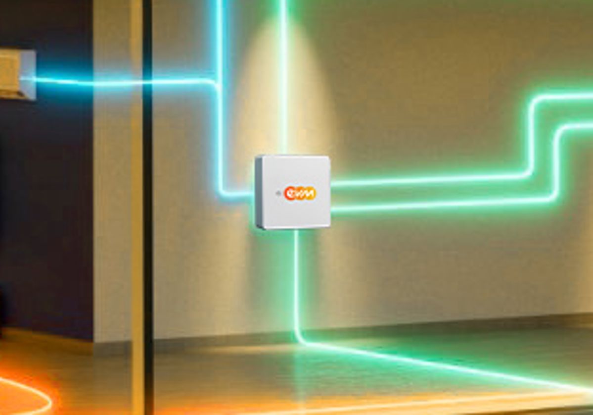 Energiehaus evm Haus bei Nacht mit eingezeichneten leuchtenden Energieflüssen