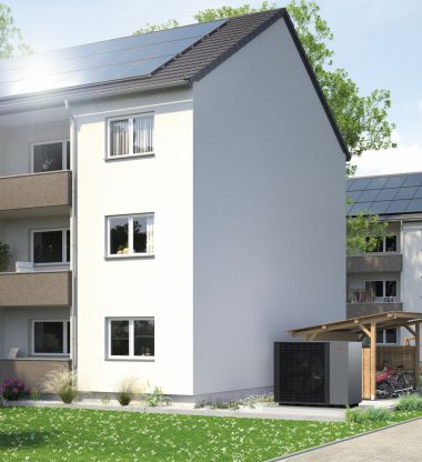 Mehrfamilienhäuser mit Photovoltaikanlage und Wärmepumpe als nachhaltige Energielösung.