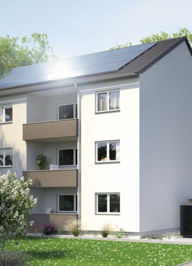 Mehrfamilienhaus mit Solar auf dem Dach im Grünen